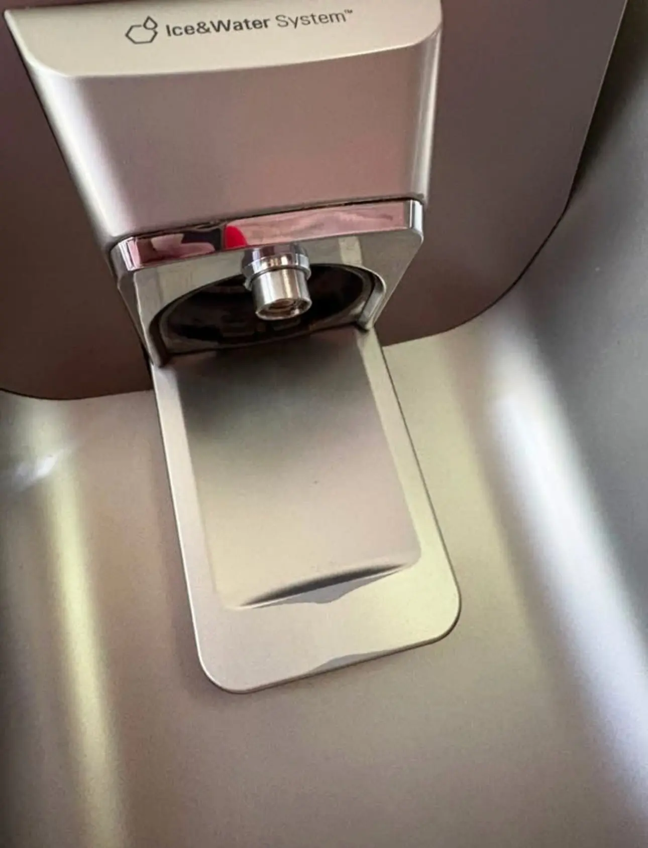 After: the same dispenser, clean and shining